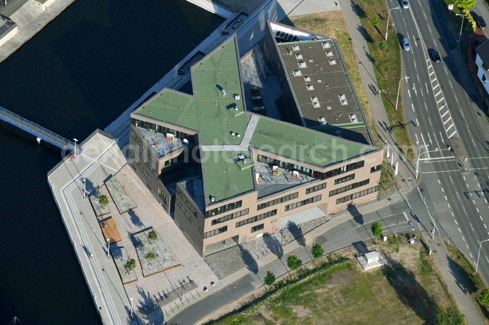 Rostock from above - Construction site to build a new office and commercial building of Centogene AG Am Strande on Holzhalbinsel in Rostock in the state Mecklenburg - Western Pomerania, Germany