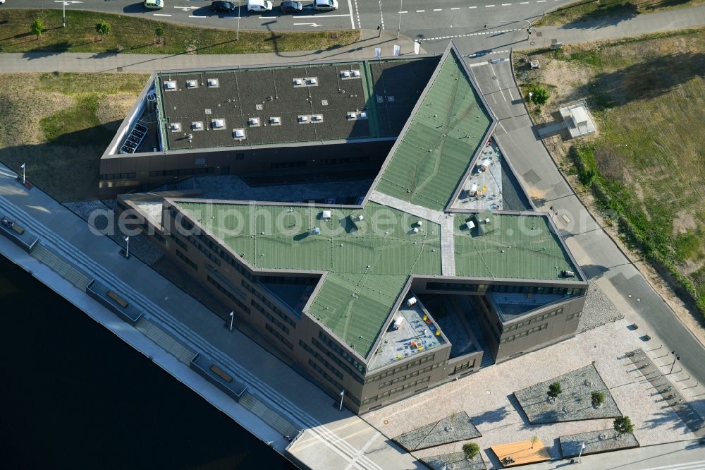 Aerial image Rostock - Construction site to build a new office and commercial building of Centogene AG Am Strande on Holzhalbinsel in Rostock in the state Mecklenburg - Western Pomerania, Germany