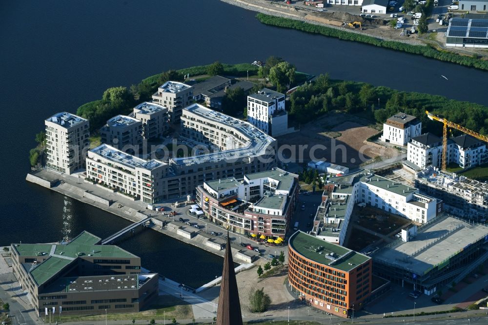 Rostock from above - Construction site to build a new office and commercial building of Centogene AG Am Strande on Holzhalbinsel in Rostock in the state Mecklenburg - Western Pomerania, Germany