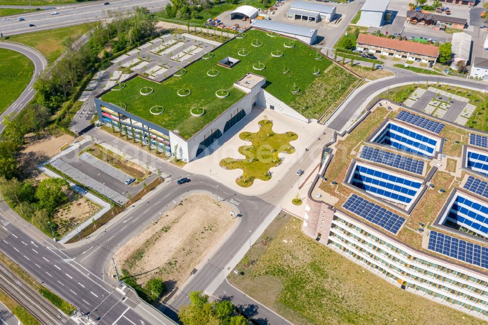 Karlsruhe from the bird's eye view: New office and commercial building of dm-drogerie markt GmbH + Co. KG on Alte Karlsruher Strasse in Karlsruhe in the state Baden-Wurttemberg, Germany