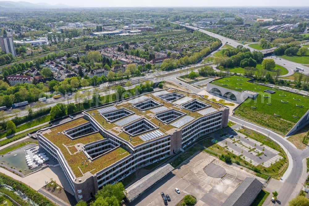 Karlsruhe from the bird's eye view: New office and commercial building of dm-drogerie markt GmbH + Co. KG on Alte Karlsruher Strasse in Karlsruhe in the state Baden-Wurttemberg, Germany