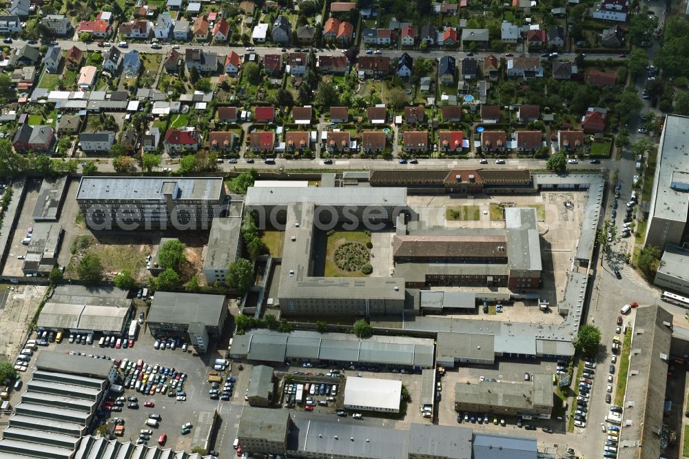 Aerial image Berlin - Tourist attraction of the historic monument Gedenkstaette Berlin-Hohenschoenhausen on Genslerstrasse in the district Alt-Hohenschoenhausen in Berlin