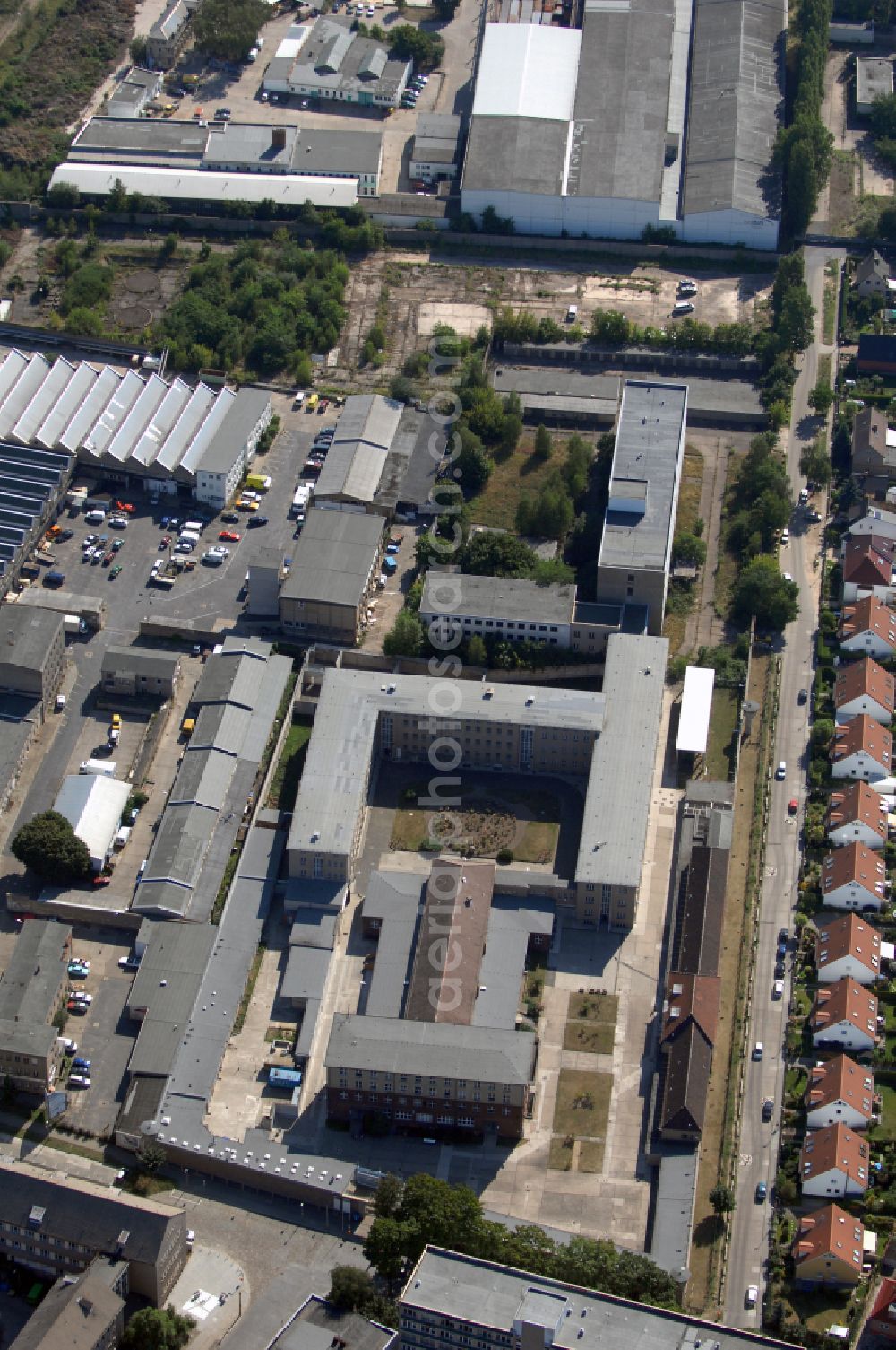 Berlin from above - Tourist attraction of the historic monument Gedenkstaette Berlin-Hohenschoenhausen on Genslerstrasse in the district Alt-Hohenschoenhausen in Berlin