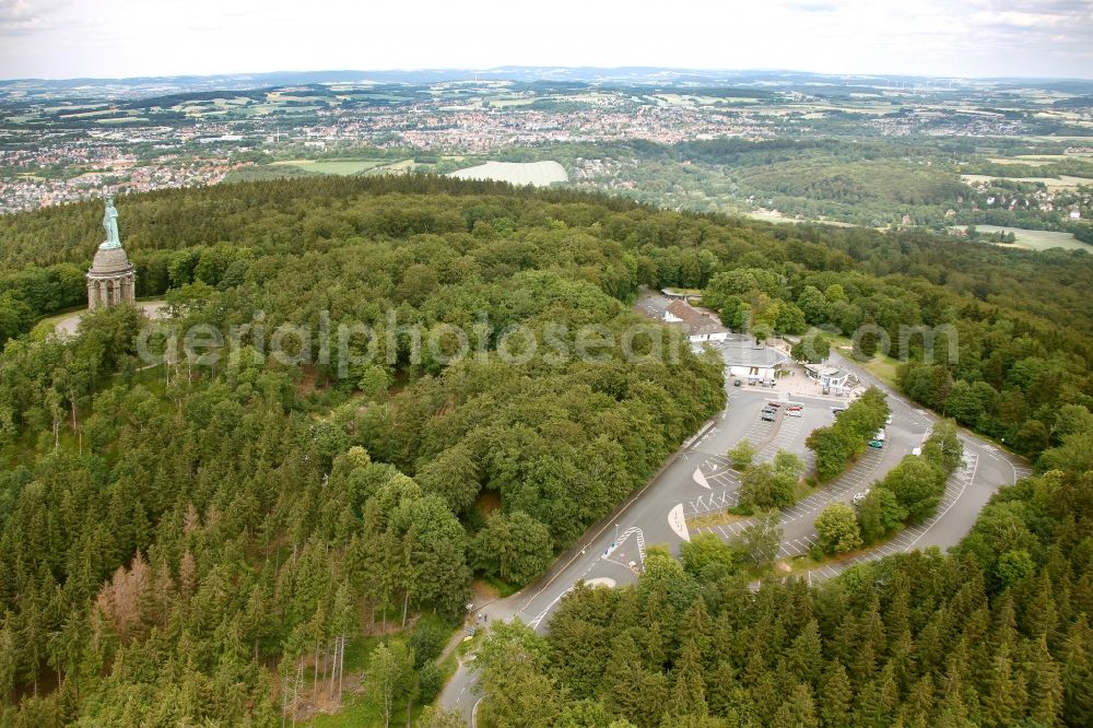 Aerial image Detmold - Tourist attraction of the historic monument Hermannsdenkmal on forest Teuteburger Wald in Detmold in the state North Rhine-Westphalia