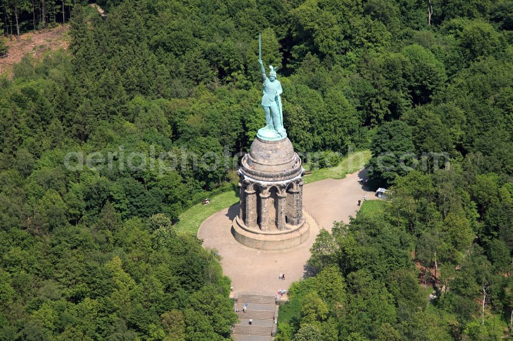 Aerial image Detmold - Tourist attraction of the historic monument Hermannsdenkmal on forest Teuteburger Wald in Detmold in the state North Rhine-Westphalia