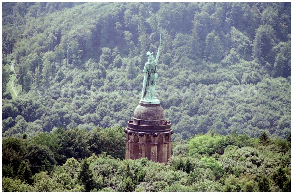 Aerial image Detmold - Tourist attraction of the historic monument Hermannsdenkmal on forest Teuteburger Wald in Detmold in the state North Rhine-Westphalia