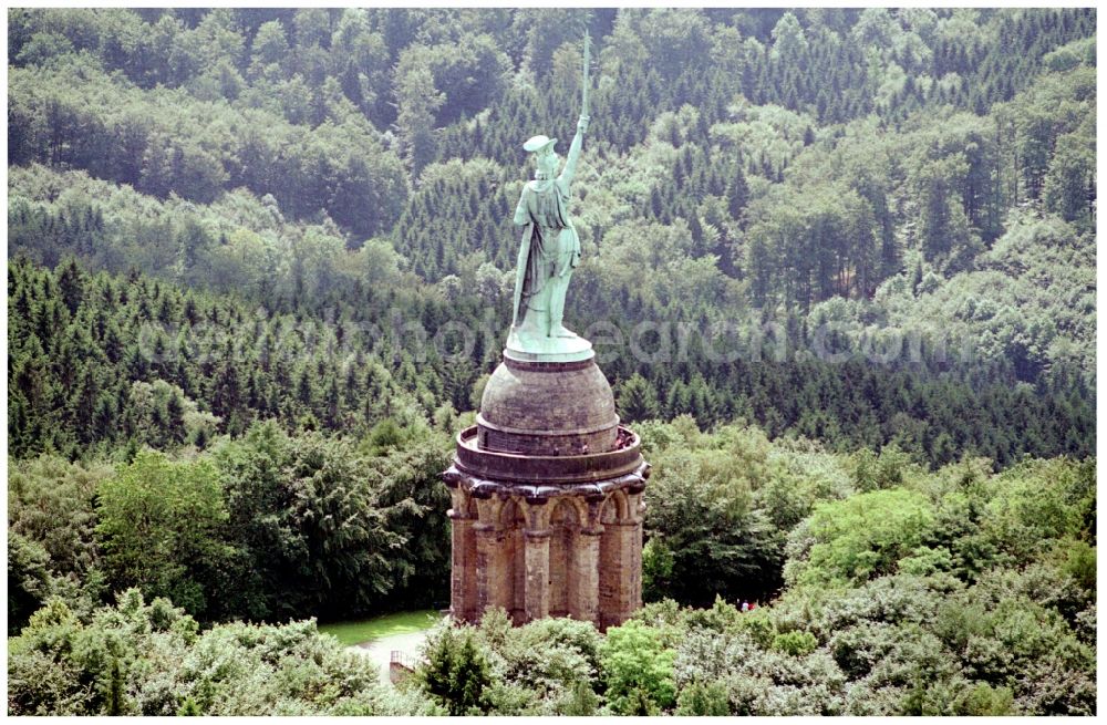 Aerial image Detmold - Tourist attraction of the historic monument Hermannsdenkmal on forest Teuteburger Wald in Detmold in the state North Rhine-Westphalia