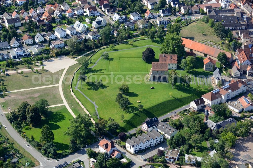 Lorsch from the bird's eye view: Tourist attraction of the historic monument Kloster Lorsch on Nibelungenstrasse in Lorsch in the state Hesse