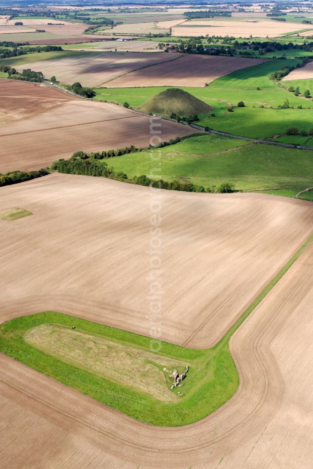 West Kennett from the bird's eye view: Tourist attraction of the historic monument stone circle West Kennet Long Barrow Marlborough in West Kennett in United Kingdom