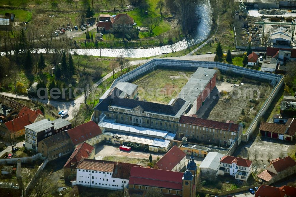 Ichtershausen from above - Prison site and security fence of the former youth correctional facility on the site of an old Cistercian monastery in Ichtershausen in the state of Thuringia, Germany