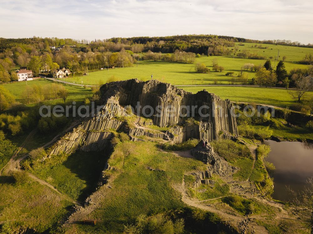 Kamenicky Senov from above - Rock massif and rock formation Herrnhausfelsen oder Herrenhausfelsen on street Marxova in the district Parchen in Kamenicky Senov in Liberecky kraj - Reichenberger Region, Czech Republic