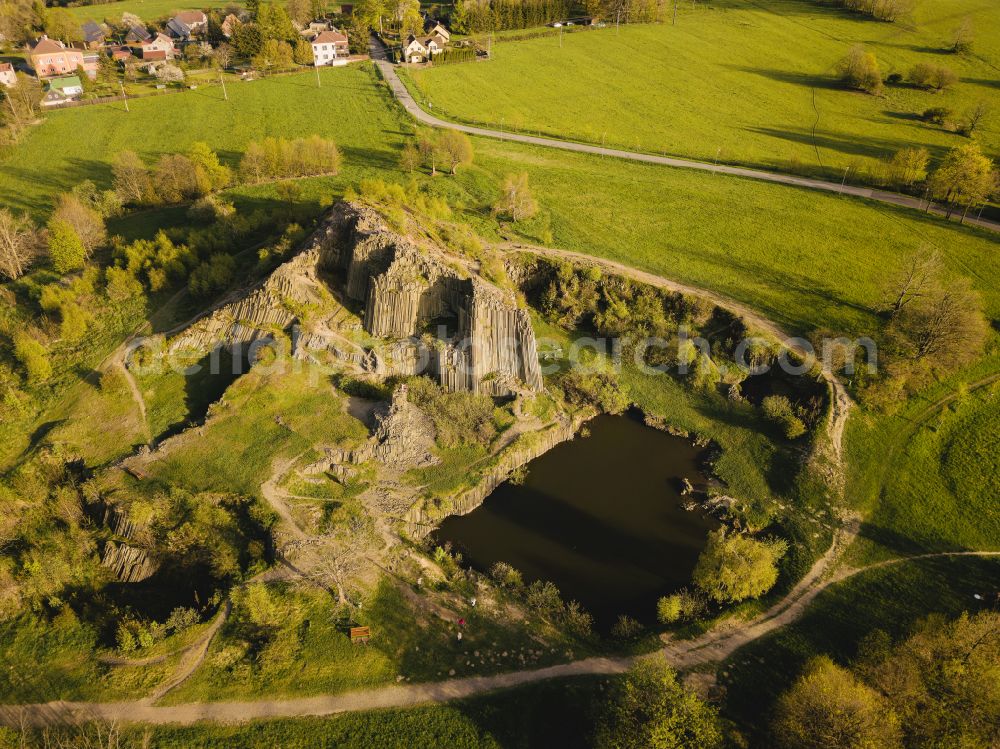 Aerial image Kamenicky Senov - Rock massif and rock formation Herrnhausfelsen oder Herrenhausfelsen on street Marxova in the district Parchen in Kamenicky Senov in Liberecky kraj - Reichenberger Region, Czech Republic