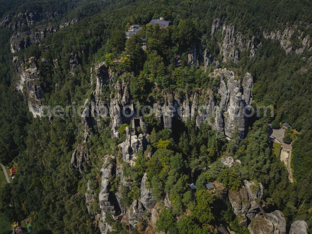 Aerial image Rathen - Rock massif and rock formation and sandstone rocks in the Elbe Sand Mountains on the road Wehlener Weg in Rathen Bastei area in the federal state of Saxony, Germany