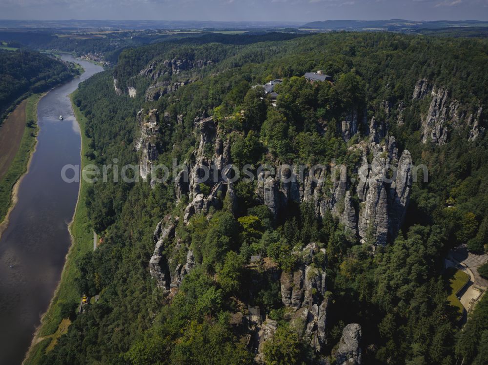 Aerial photograph Rathen - Rock massif and rock formation and sandstone rocks in the Elbe Sand Mountains on the road Wehlener Weg in Rathen Bastei area in the federal state of Saxony, Germany