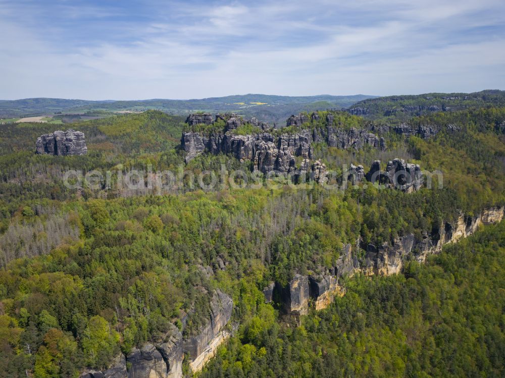 Bad Schandau from above - Rock massif and rock formation Schrammsteinkette on street Vorder Winkel in Bad Schandau Elbe Sandstone Mountains in the state Saxony, Germany