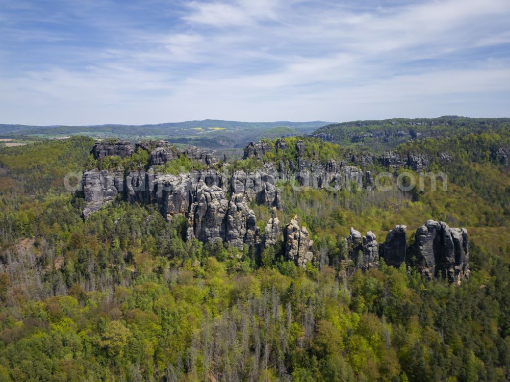 Bad Schandau from the bird's eye view: Rock massif and rock formation Schrammsteinkette on street Vorder Winkel in Bad Schandau Elbe Sandstone Mountains in the state Saxony, Germany