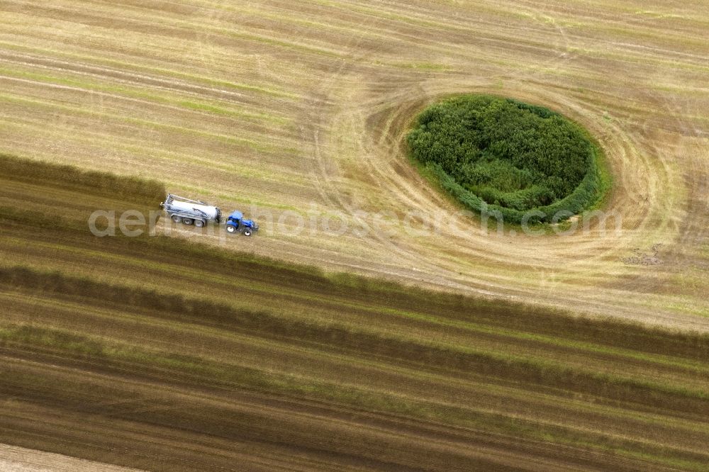 Aerial photograph Kramerhof - Grain harvest in a field near Kramerhof in Mecklenburg - Western Pomerania