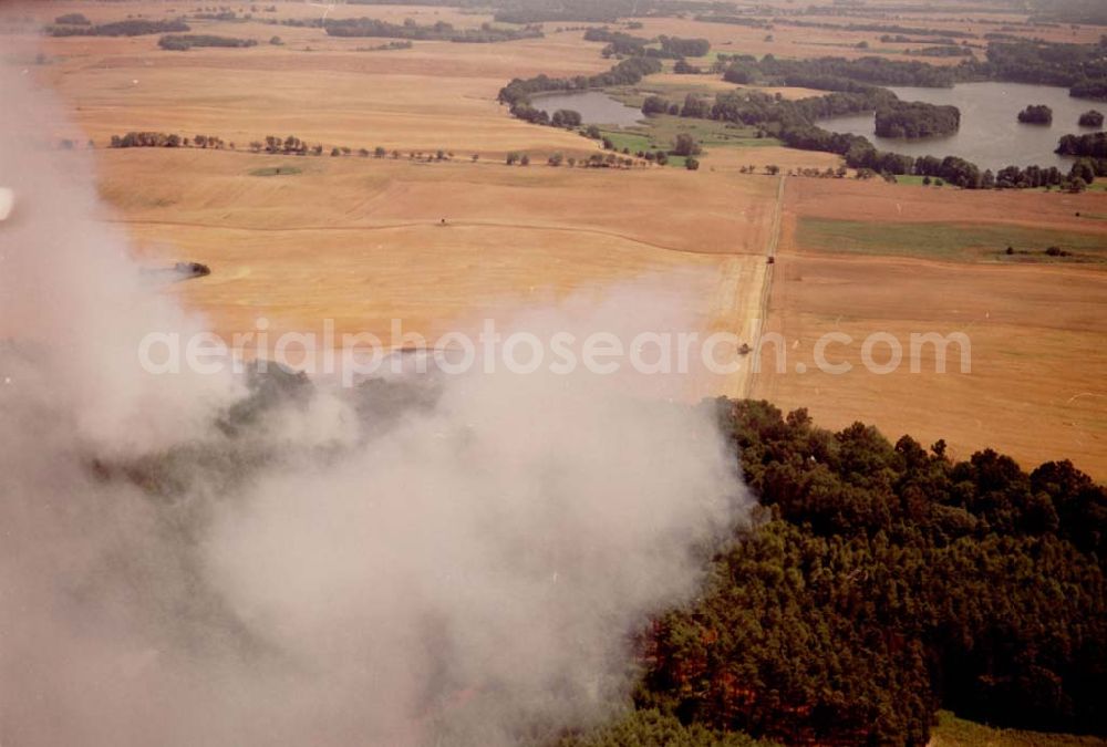 Aerial photograph Buckow - Getreidefeldbrand südlich von Buckow in der Märkischen Schweiz am 09.07.02 gegen 14:00 Uhr MEZ