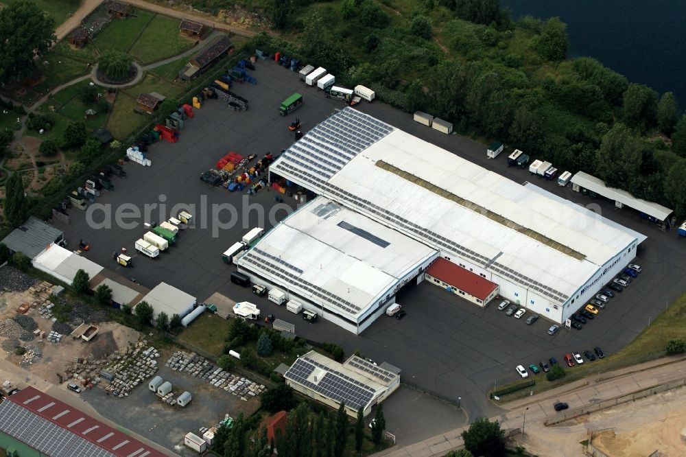 Nordhausen from the bird's eye view: The headquarters and beverage market Wipper Taler drinks GmbH is located in the concrete road in Nordhausen in Thuringia