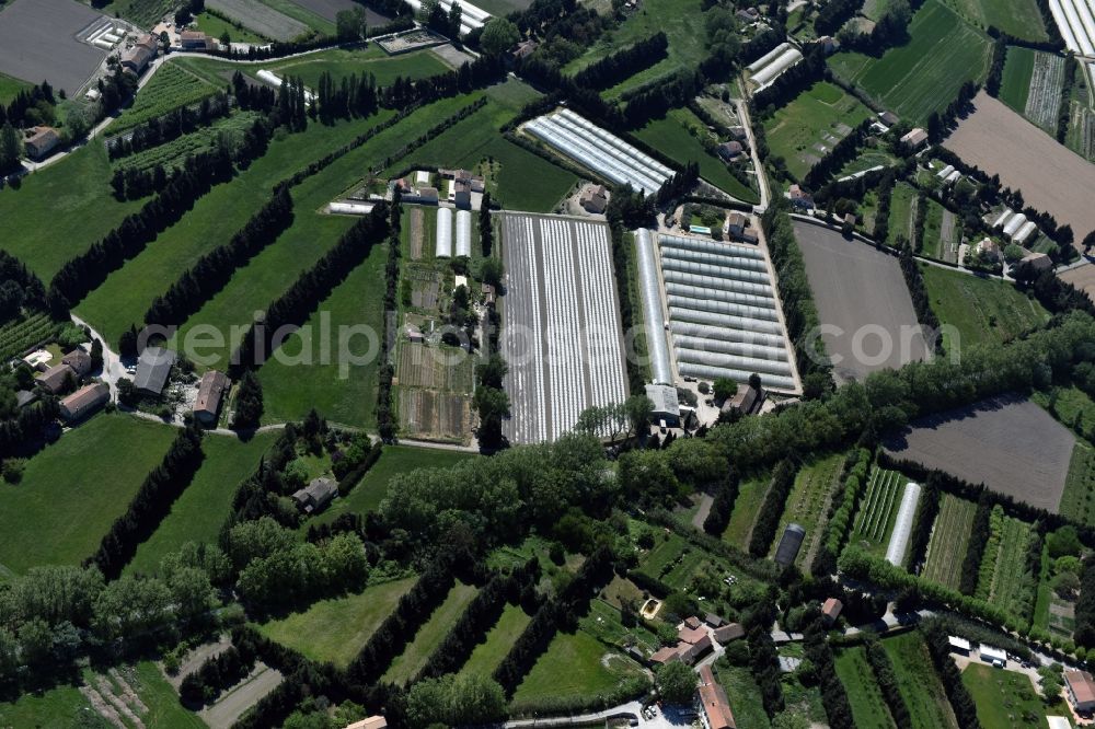 Aerial photograph Avignon - Glass roof surfaces in the greenhouse for vegetable growing ranks in Avignon in Provence-Alpes-Cote d'Azur, France