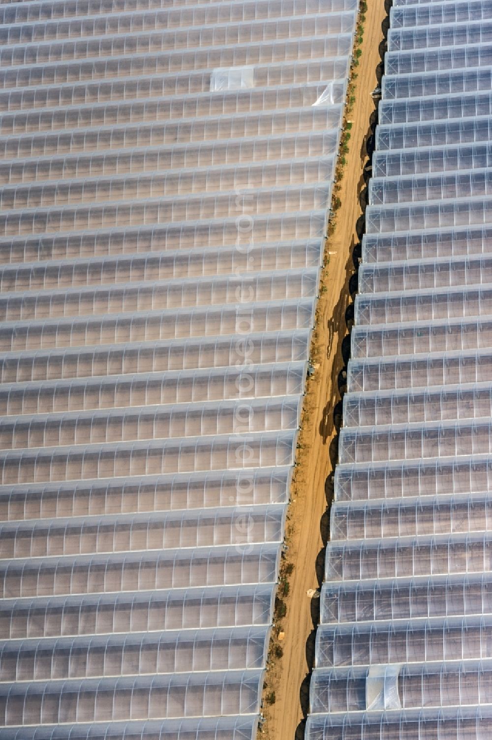 Aerial photograph Torre del Greco - Glass roof surfaces in the greenhouse for vegetable growing ranks in Torre del Greco in Italy