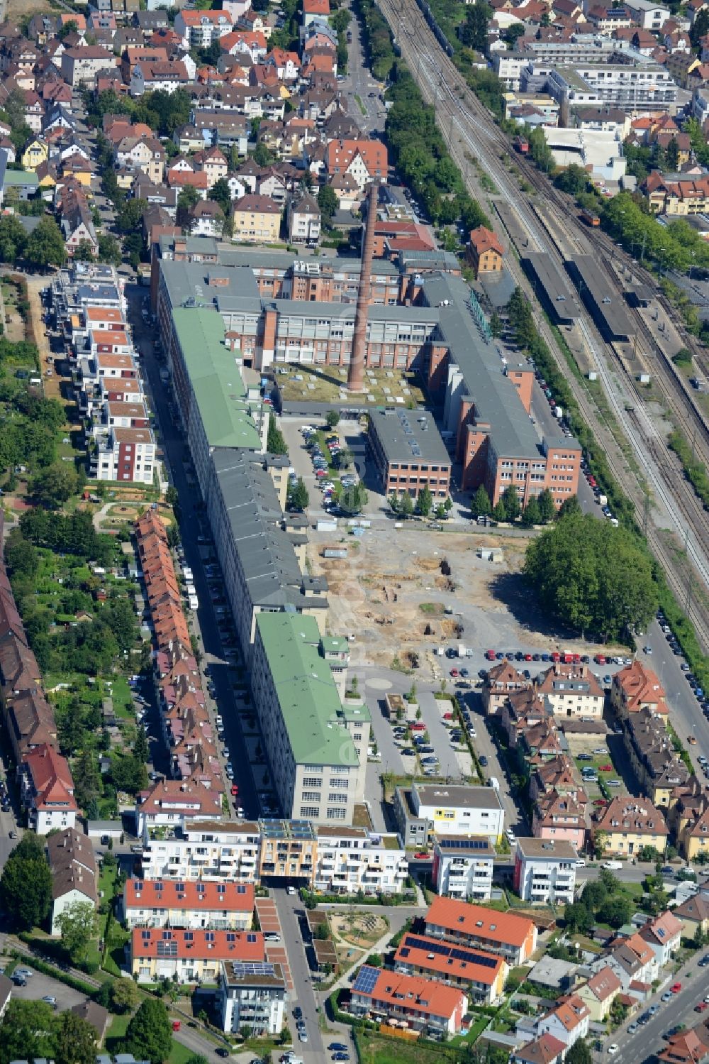 Kornwestheim from the bird's eye view: Company and residential area Salaman der-Areal in Kornwestheim in the state of Baden-Wuerttemberg. The former factory consists of shopping and living quarters