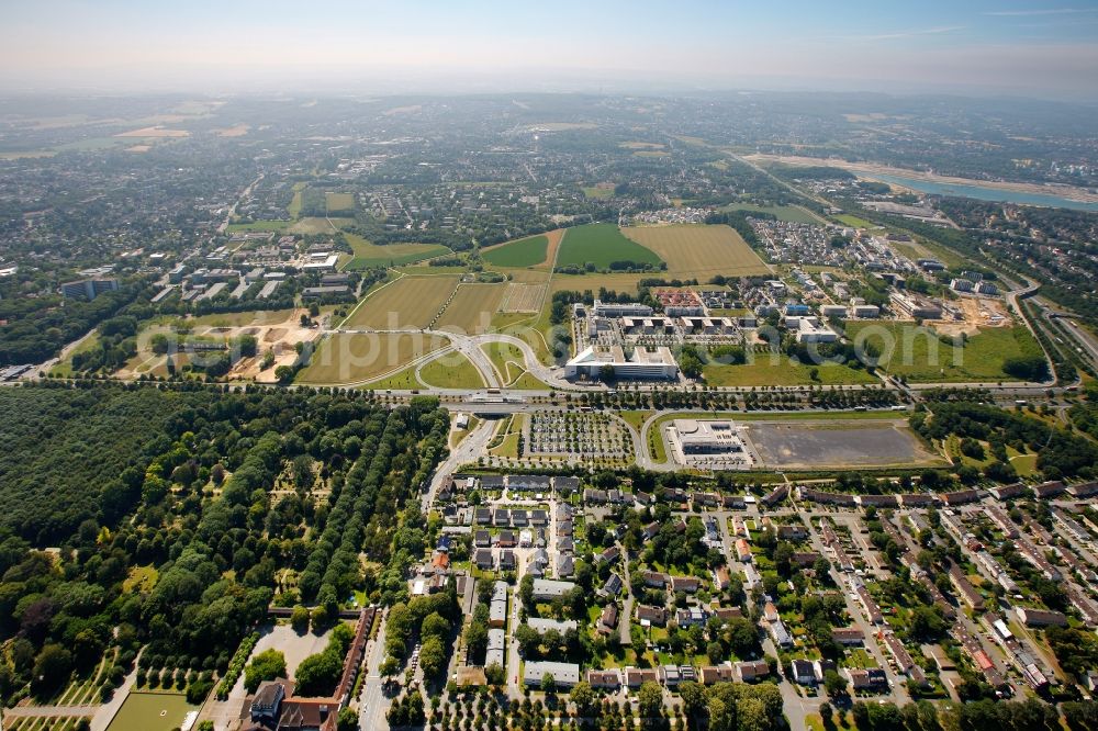 Aerial image Dortmund - View of commercial and residential areas in Aplerbeck Borough in the suburban Schueren-Neu in Dortmund in North Rhine-Westphalia. Among other things the hotel building of the Holiday Inn Express Dortmund at the Freier-Vogel-Strasse. Areas are near the Hauptfriedhof