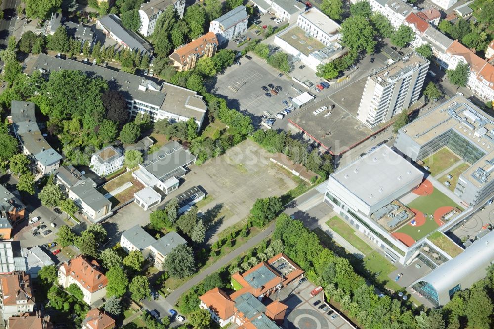 Berlin from above - Gewerbebrache der ehemaligen KFZ - Pruefstelle Zehlendorf an der Charlottenstrasse in the residential area of a multi-family house settlement in Berlin in Germany. The company CDS housing Berlin GmbH is planning to build a modern residential complex