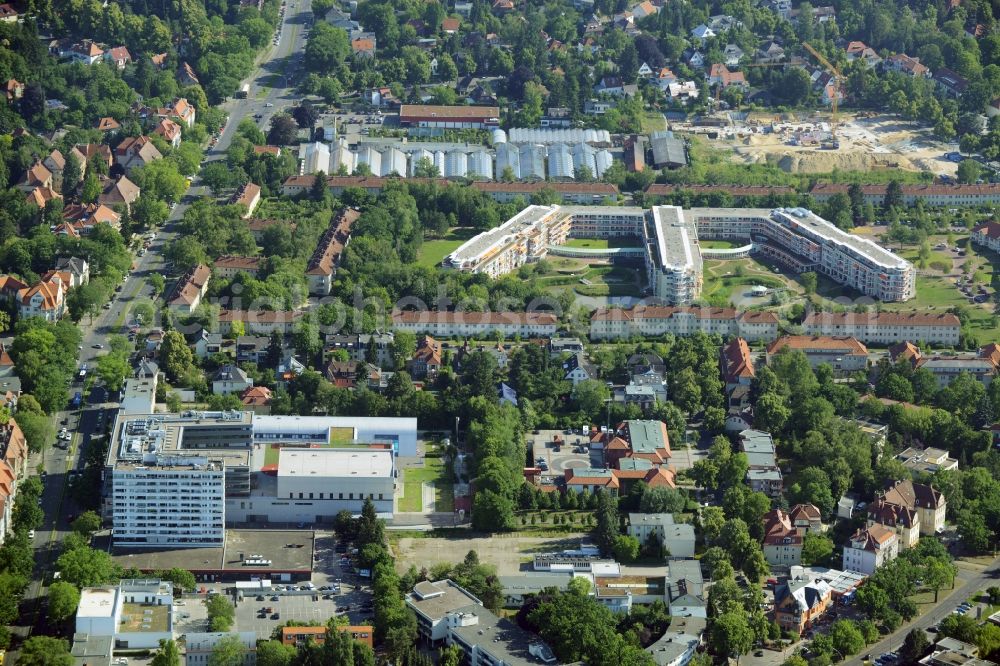 Aerial image Berlin - Gewerbebrache der ehemaligen KFZ - Pruefstelle Zehlendorf an der Charlottenstrasse in the residential area of a multi-family house settlement in Berlin in Germany. The company CDS housing Berlin GmbH is planning to build a modern residential complex