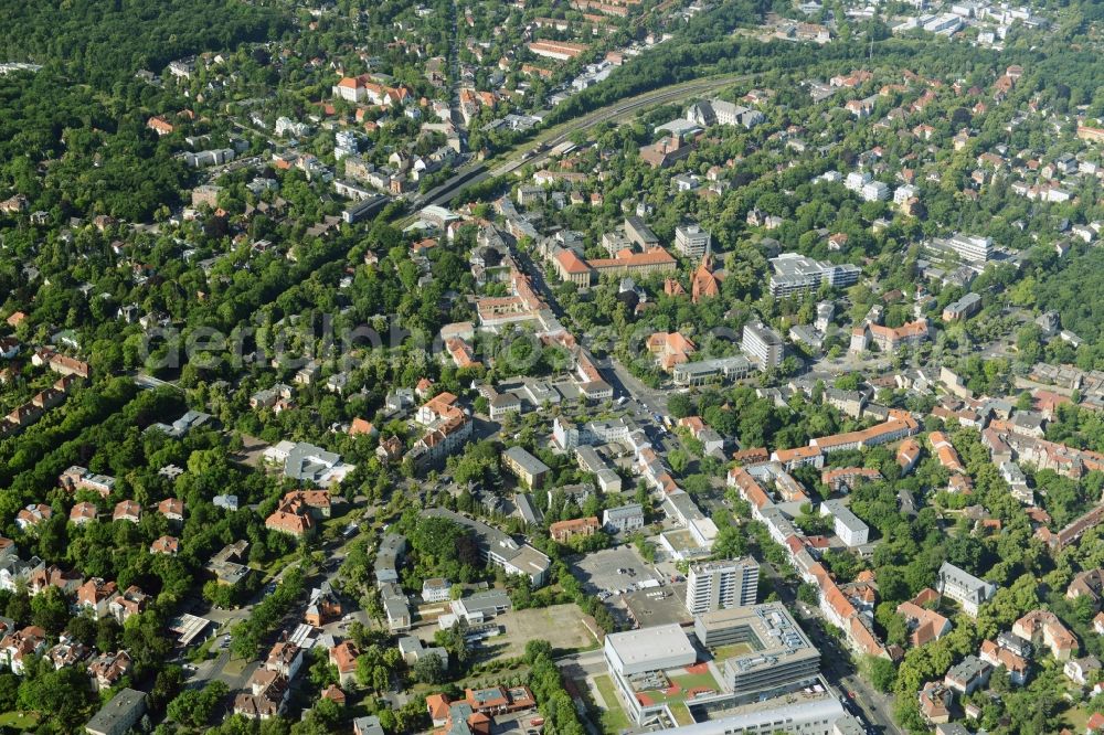 Aerial photograph Berlin - Gewerbebrache der ehemaligen KFZ - Pruefstelle Zehlendorf an der Charlottenstrasse in the residential area of a multi-family house settlement in Berlin in Germany. The company CDS housing Berlin GmbH is planning to build a modern residential complex