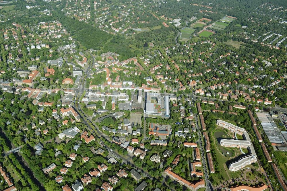 Berlin from the bird's eye view: Gewerbebrache der ehemaligen KFZ - Pruefstelle Zehlendorf an der Charlottenstrasse in the residential area of a multi-family house settlement in Berlin in Germany. The company CDS housing Berlin GmbH is planning to build a modern residential complex