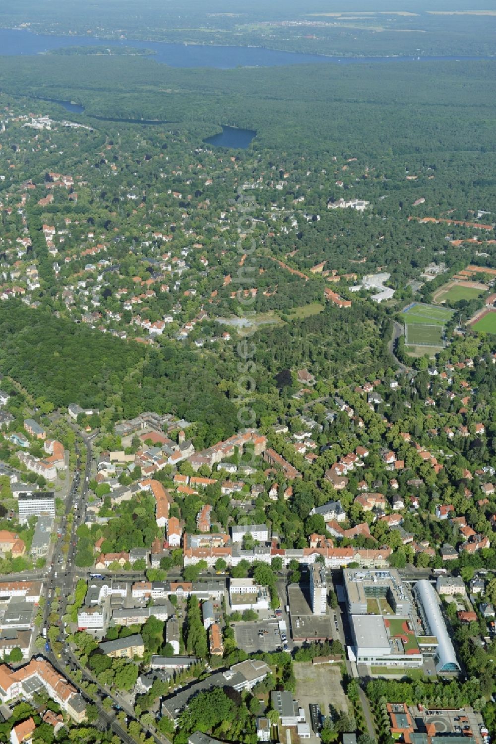 Aerial image Berlin - Gewerbebrache der ehemaligen KFZ - Pruefstelle Zehlendorf an der Charlottenstrasse in the residential area of a multi-family house settlement in Berlin in Germany. The company CDS housing Berlin GmbH is planning to build a modern residential complex