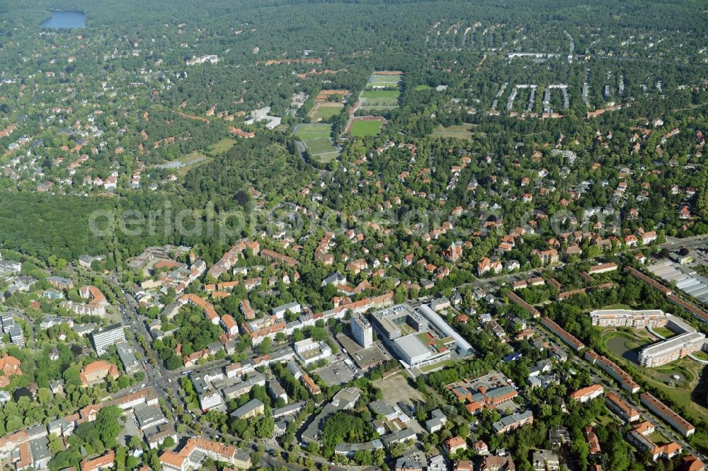 Aerial photograph Berlin - Gewerbebrache der ehemaligen KFZ - Pruefstelle Zehlendorf an der Charlottenstrasse in the residential area of a multi-family house settlement in Berlin in Germany. The company CDS housing Berlin GmbH is planning to build a modern residential complex