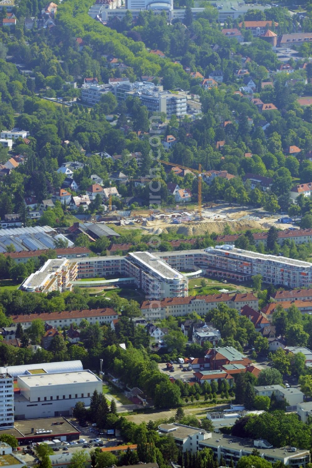 Berlin from above - Gewerbebrache der ehemaligen KFZ - Pruefstelle Zehlendorf an der Charlottenstrasse in the residential area of a multi-family house settlement in Berlin in Germany. The company CDS housing Berlin GmbH is planning to build a modern residential complex