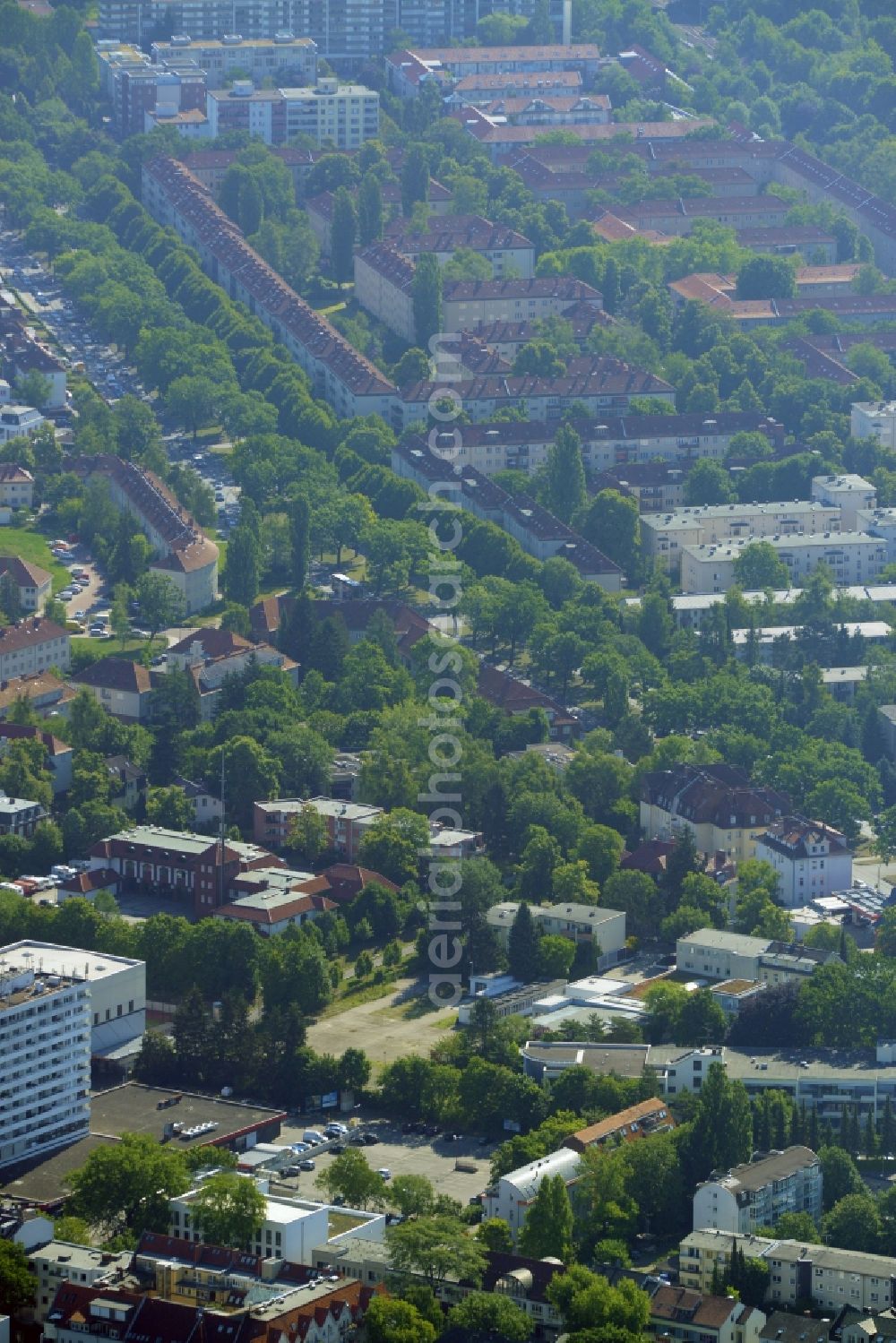 Aerial photograph Berlin - Gewerbebrache der ehemaligen KFZ - Pruefstelle Zehlendorf an der Charlottenstrasse in the residential area of a multi-family house settlement in Berlin in Germany. The company CDS housing Berlin GmbH is planning to build a modern residential complex