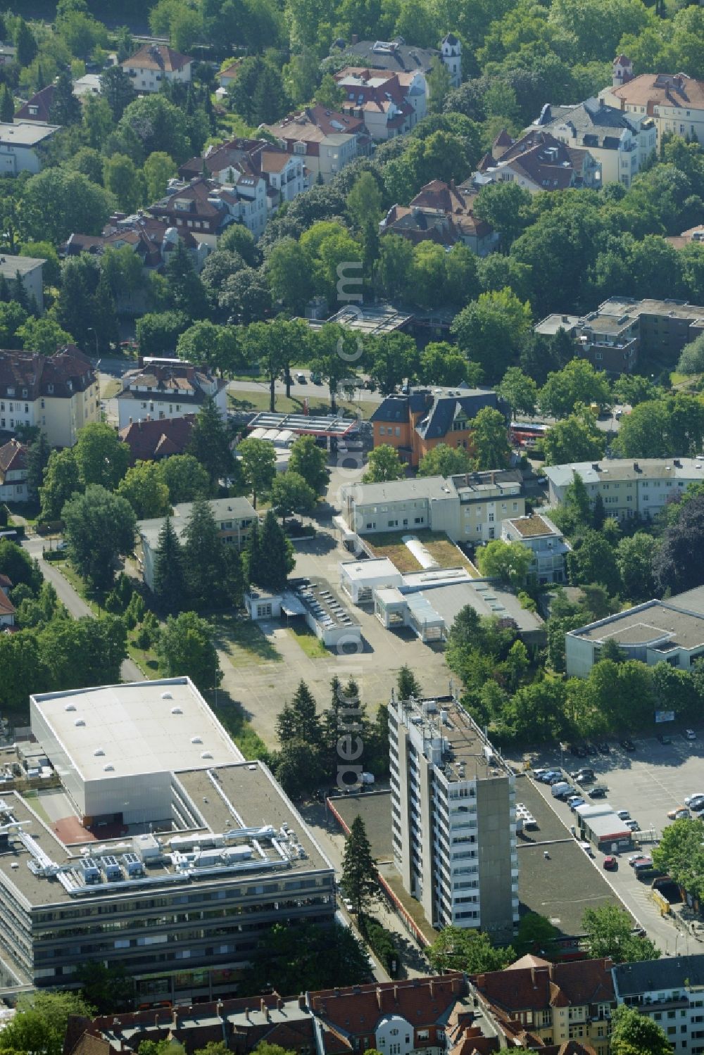 Aerial photograph Berlin - Gewerbebrache der ehemaligen KFZ - Pruefstelle Zehlendorf an der Charlottenstrasse in the residential area of a multi-family house settlement in Berlin in Germany. The company CDS housing Berlin GmbH is planning to build a modern residential complex