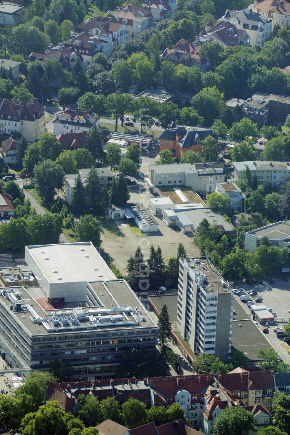 Berlin from above - Gewerbebrache der ehemaligen KFZ - Pruefstelle Zehlendorf an der Charlottenstrasse in the residential area of a multi-family house settlement in Berlin in Germany. The company CDS housing Berlin GmbH is planning to build a modern residential complex