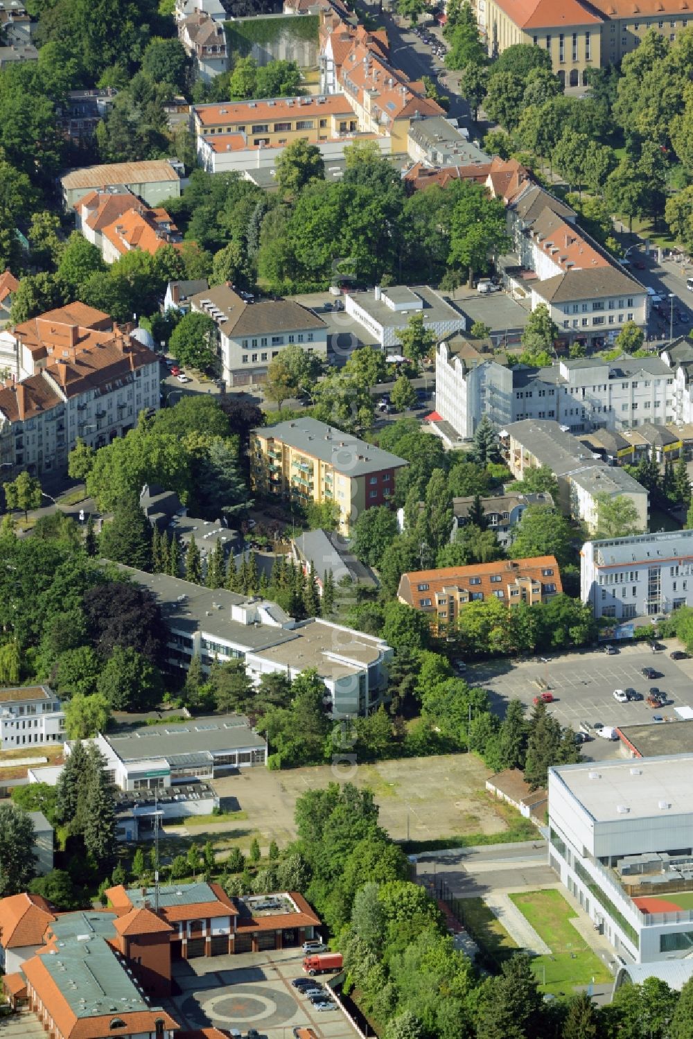 Aerial photograph Berlin - Gewerbebrache der ehemaligen KFZ - Pruefstelle Zehlendorf an der Charlottenstrasse in the residential area of a multi-family house settlement in Berlin in Germany. The company CDS housing Berlin GmbH is planning to build a modern residential complex