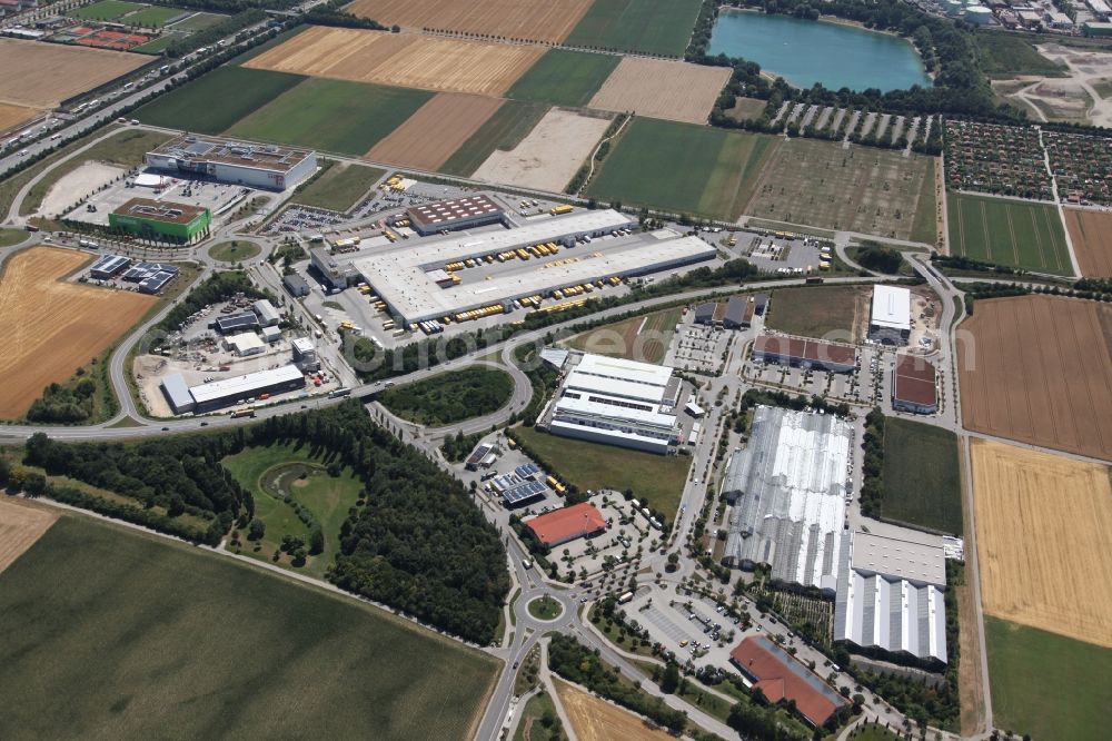 Aschheim from above - Industrial estate and company settlement in Aschheim southeast in the state Bavaria. Above the center of the picture the DHL cargo center Aschheim Freising