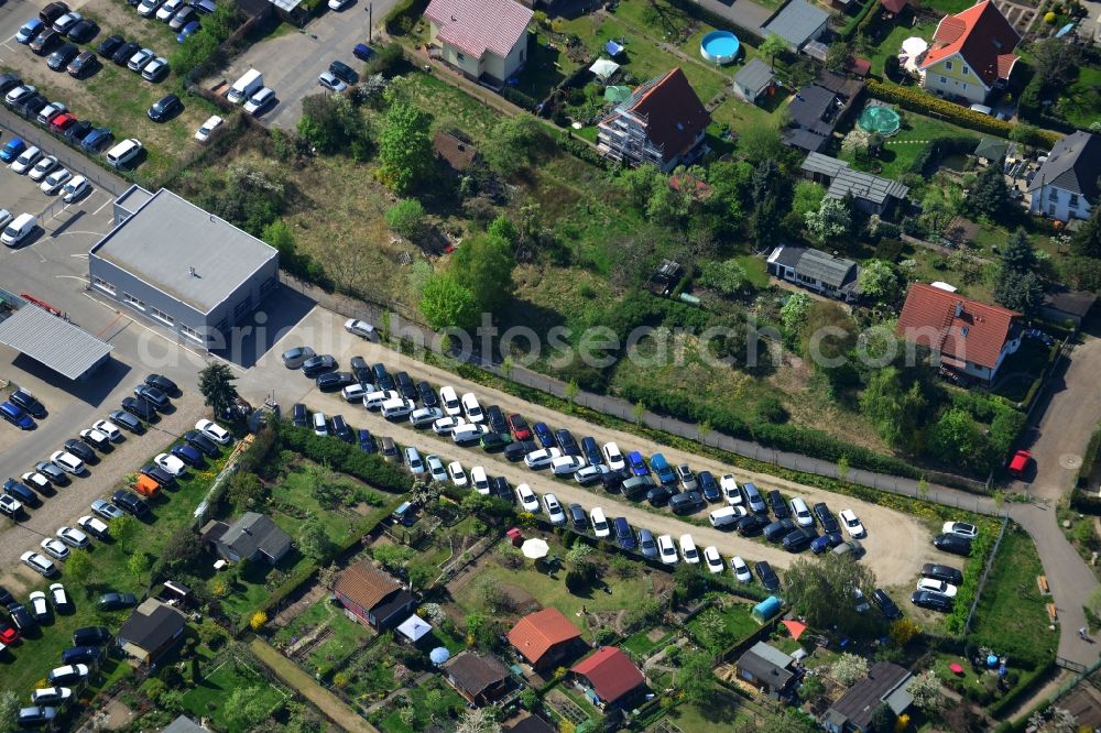 Berlin from the bird's eye view: View at the industrial area Hansastraße in the district Weissensee in Berlin. Here are among others several car dealers, workshops and an inspection workshop of the DEKRA located