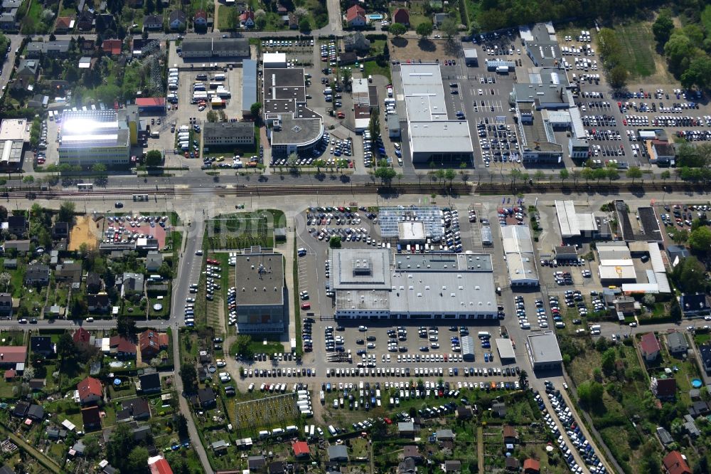 Berlin from above - View at the industrial area Hansastraße in the district Weissensee in Berlin. Here are among others several car dealers, workshops and an inspection workshop of the DEKRA located