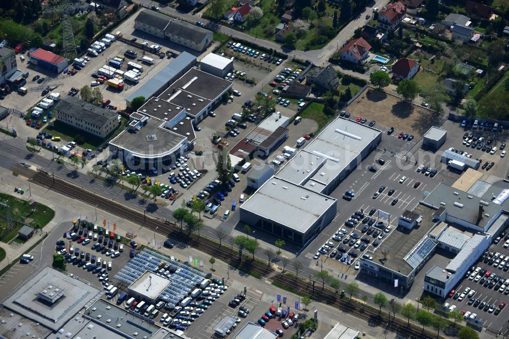 Aerial image Berlin - View at the industrial area Hansastraße in the district Weissensee in Berlin. Here are among others several car dealers, workshops and an inspection workshop of the DEKRA located