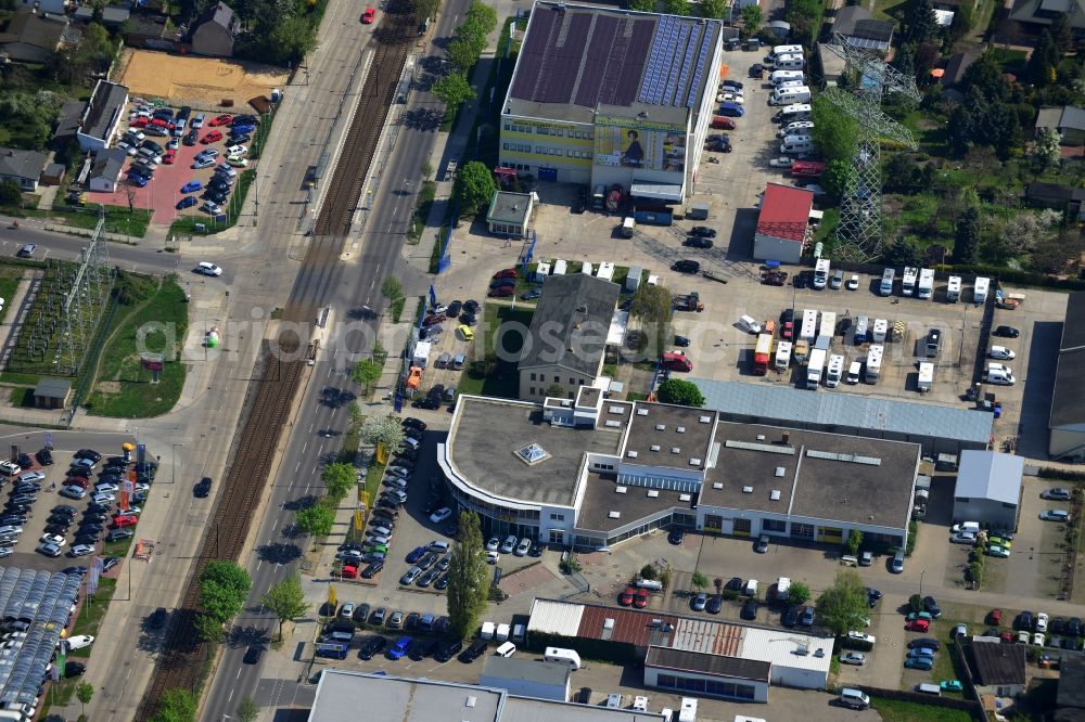 Berlin from above - View at the industrial area Hansastraße in the district Weissensee in Berlin. Here are among others several car dealers, workshops and an inspection workshop of the DEKRA located