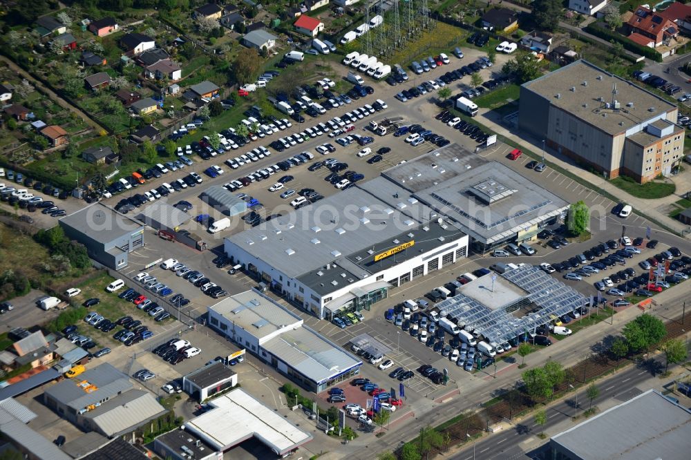 Berlin from the bird's eye view: View at the industrial area Hansastraße in the district Weissensee in Berlin. Here are among others several car dealers, workshops and an inspection workshop of the DEKRA located