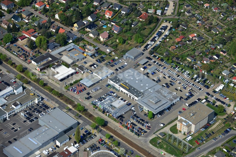 Berlin from above - View at the industrial area Hansastraße in the district Weissensee in Berlin. Here are among others several car dealers, workshops and an inspection workshop of the DEKRA located