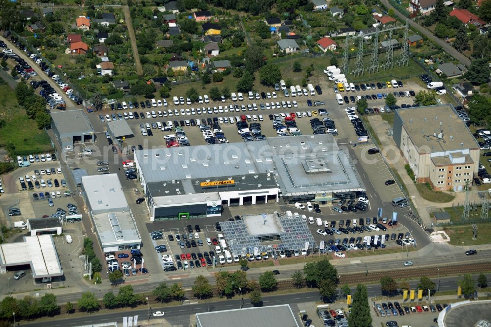 Aerial image Weißensee, Berlin - View at the industrial area Hansastrasse in the district Weissensee in Berlin. Here are among others several car dealers, workshops and an inspection workshop of the DEKRA located