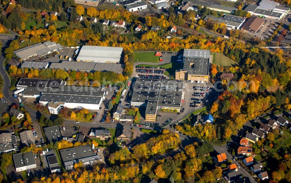 Aerial image Neheim - Industrial estate and company settlement on Bergheim in Neheim in the state of North Rhine-Westphalia. The commercial area with its companies is located on the street Donnerfeld