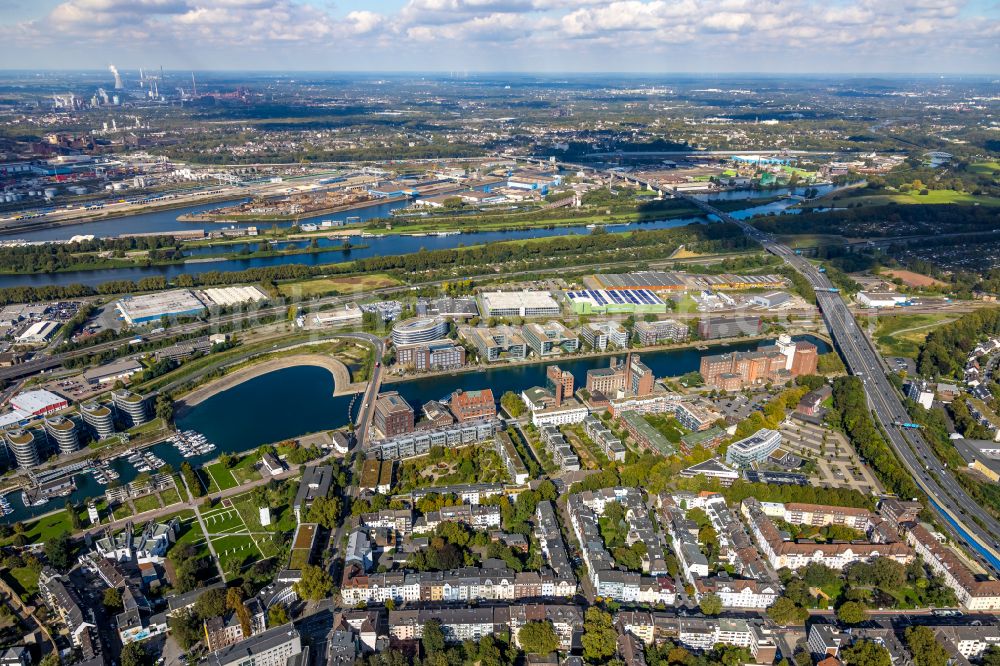 Duisburg from above - Commercial area and company settlement with a view of the business buildings on the bank of the inner harbor in the district Kasslerfeld in Duisburg in the Ruhr area in the state North Rhine-Westphalia, Germany