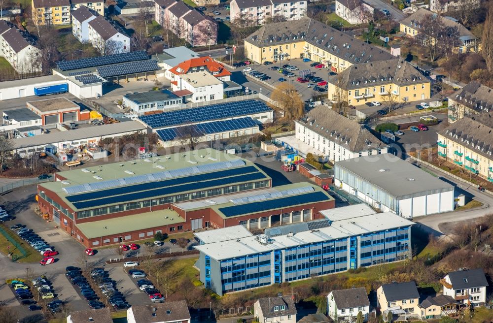 Menden (Sauerland) from the bird's eye view: Industrial estate and company settlement with overlooking the Stadtwerke Menden Am Papenbusch in Menden (Sauerland) in the state North Rhine-Westphalia, Germany