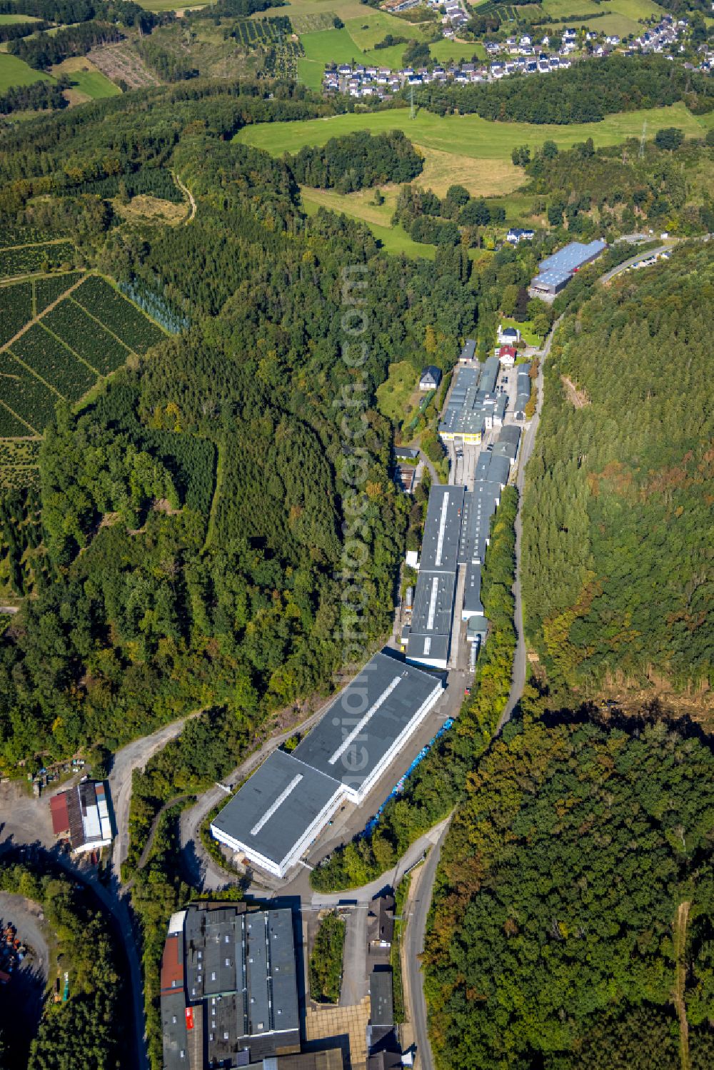 Aerial photograph Bonzel - Industrial estate and company settlement on street Dr.-Paul-Mueller-Strasse in Bonzel in the state North Rhine-Westphalia, Germany